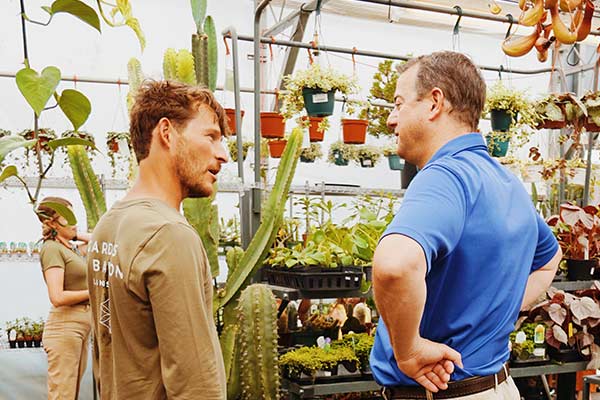 Men Talking About Plants